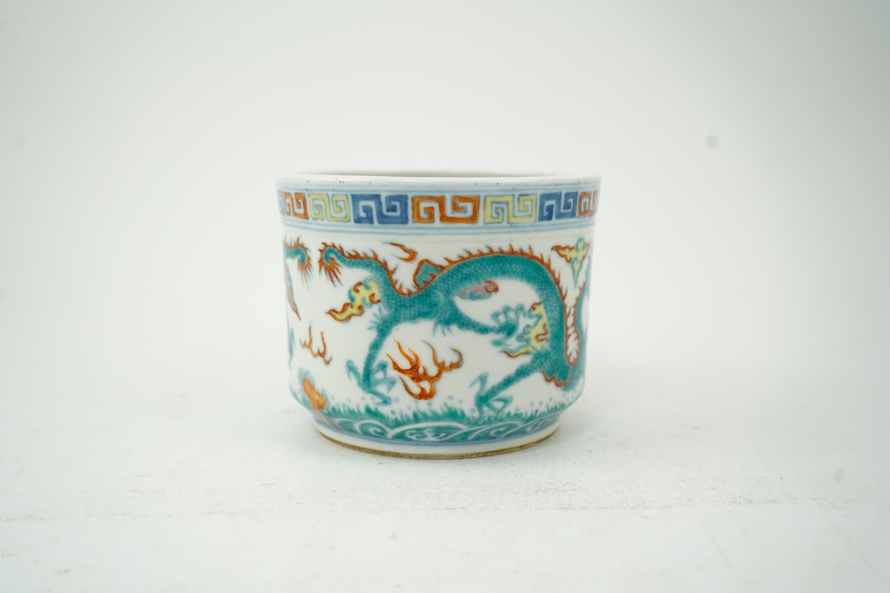 A Chinese doucai ‘dragon’ brushpot, Guangxu six character mark